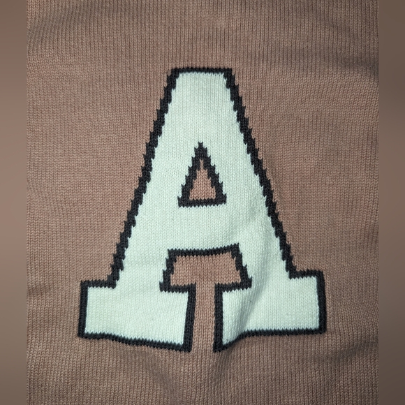 2/$18. H&M pink shirt. Letter "A" size 12-18 months. - Picture 2 of 3
